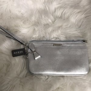 GUESS silver clutch w/ bow